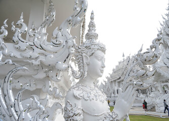 Closeup shot of a angel statue in the White Temple in Chiang Rai, Thailand