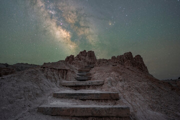 Rocky steps leading towards the Milky Way Galaxy in rural Nevada 