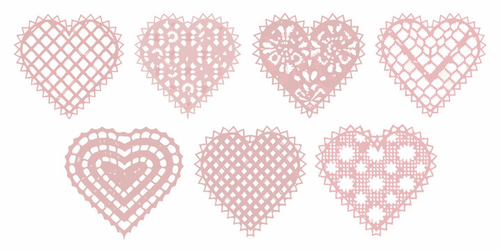 A collection of delicate pink lace hearts in various ornamental designs