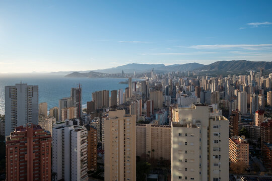 Benidorm Spain Mediterranean skyline with skyscraper apartment towers on the coastal architecture showing residential tourism and modern cityscape