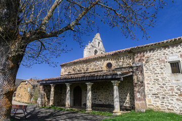 Obraz premium Stone Church of San Miguel in Verde?a with bell gable