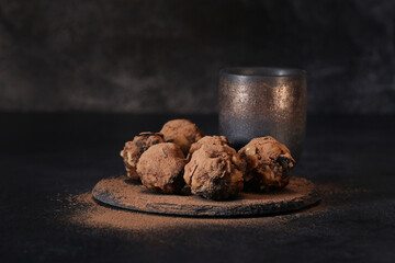homemade sweets made from prunes, dates and nuts. The candies are round. candies for healthy eating.