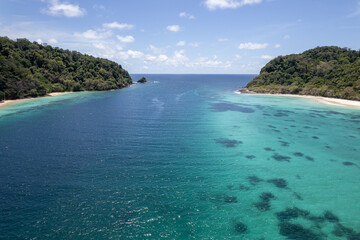 Tropical paradise white sand beach with palm trees on Koh Rok, Mu Ko Lanta National Park.