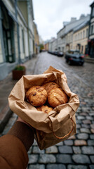 morning walk with pastries in hand