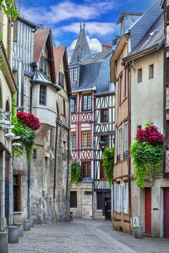 Medieval half-timbered houses on a street in Rouen downtown, Normandy, France