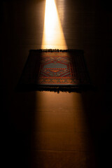 Golden Light on Prayer Rug in Dark Room Ramadan Kareem Devotion, Jumma Mubarak Solitude, Sacred Moment of Worship
