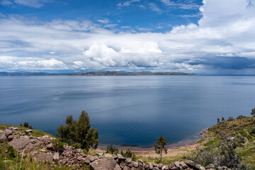Fototapeta premium Scenic view of nature and terraced fields on Taquile Island, Peru