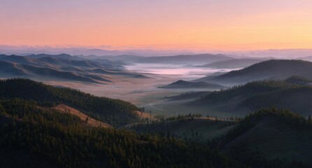 Serene sunrise over misty mountain valley with rolling hills and forests