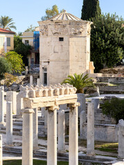 Tower of the Winds in the Roman Agora, Athens, Greece. Octagonal marble tower with eight reliefs of...