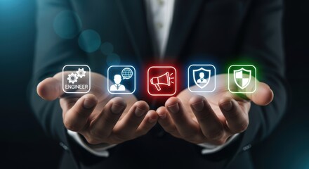 Businessman hands holding diverse luminous digital icons symbolizing corporate services on dark background