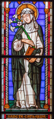 Fototapeta premium Piacenza - The St. Catherine of Siena in the stained glass in church Basilica di San Francesco by Franz Xaver Zettler from year 1889.