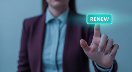 Business hand tapping a glowing renew button on a digital interface