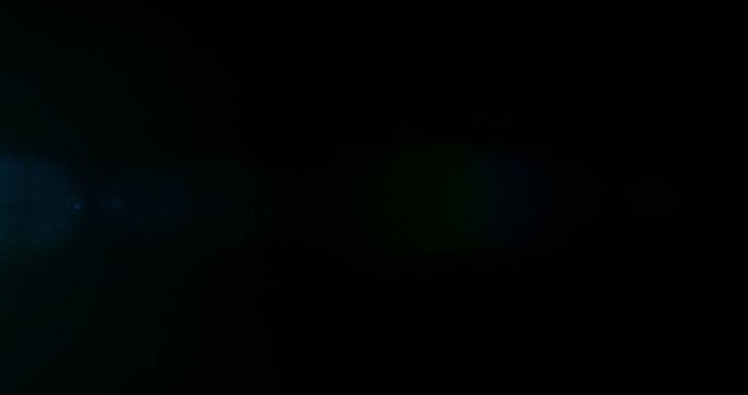 Slow motion cinematic lens flare and light leak effect isolated on black background. Perfect overlay for VFX, transitions, title reveals, film burn style and glow highlights.