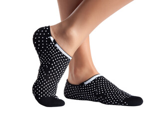 Stylish feet wearing a pair of modern socks in a studio setting. Showing the intricate design and comfortable fit of the footwear Isolated Transparent Background, PNG