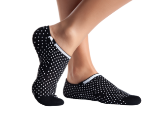 Stylish feet wearing a pair of modern socks in a studio setting. Showing the intricate design and comfortable fit of the footwear Isolated Transparent Background, PNG