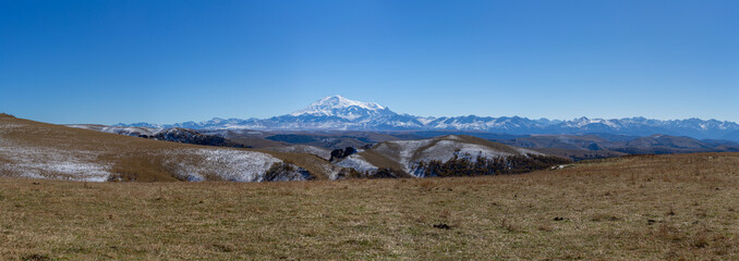 Panoramic view of the snow-capped mount Elbrus and the Main Caucasian Range