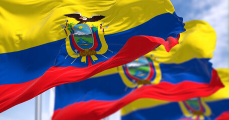 Ecuador national flags waving in the wind on a clear day