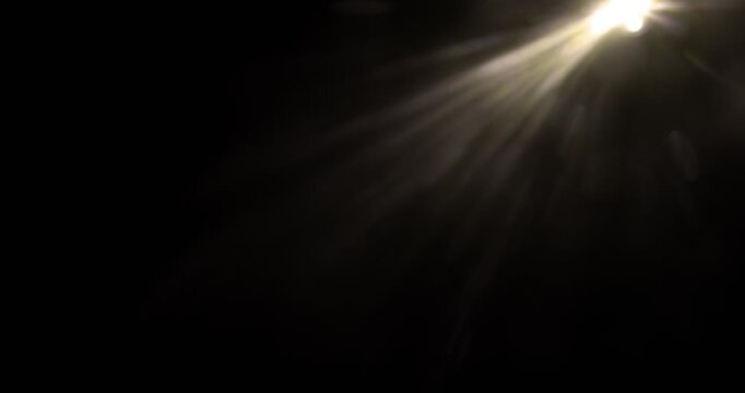 Slow motion cinematic lens flare and light leak effect isolated on black background. Perfect overlay for VFX, transitions, title reveals, film burn style and glow highlights.