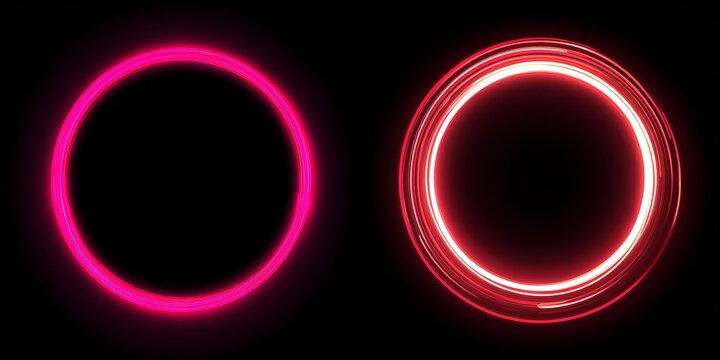 Two glowing neon circles pink and red on black image