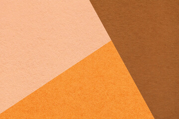 Fototapeta premium Geometric brown orange peach texture paper background with copy space for presentation, banner template