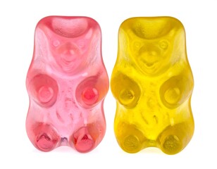 Colorful gummy bears on white background.