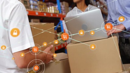 Animation of network of connections with icons over diverse workers using laptop in warehouse - Powered by Adobe