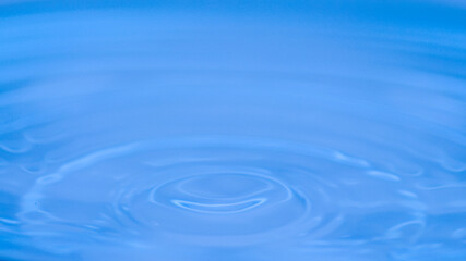 Water surface with ripples, evoking a sense of calmness and tranquility