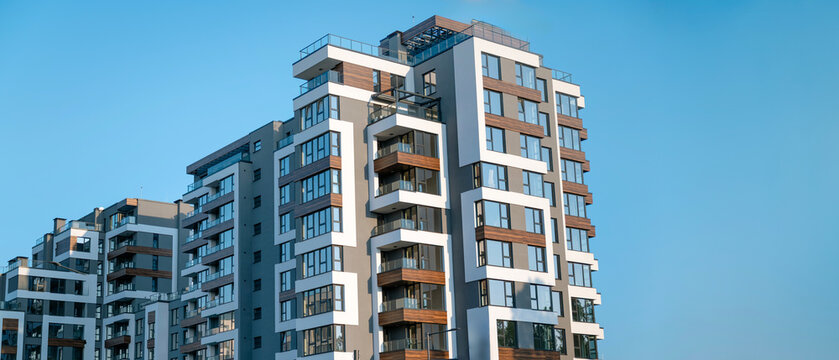 Modern  Residential Apartment Building Complex Condo on a Blue sky background