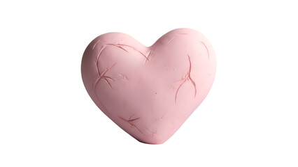 A pastel pink heart-shaped object with a smooth surface and visible scratches and marks on its surface
