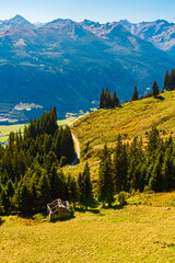 Alpine summer view with a destroyed wooden hut at Mount Resterkogel, Mittersill, Oberpinzgau, Salzburg, Austria