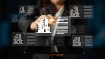 A businesswoman interacts with a tablet showcasing virtual real estate listings and analytics, emphasizing technology role in modern property management and communication. Gantry