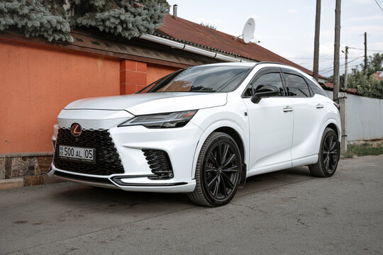 Almaty, Kazakhstan - July 30, 2025: A white Lexus RX500h in a parking lot
