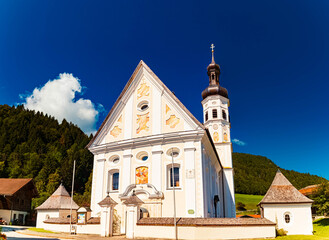 Church on a sunny summer day at Sachrang, Aschau im Chiemgau, Rosenheim, Bavaria, Germany