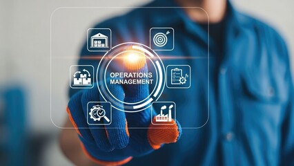 Worker in gloves interacting with a holographic display centered on "OPERATIONS MANAGEMENT," surrounded by icons for logistics, production, and quality control, illustrating efficient business process