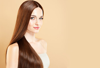 Obraz na płótnie Canvas Beautiful model girl with shiny brown and straight long hair . Keratin straightening . Treatment, care and spa procedures. Smooth hairstyle. 
