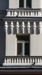 entablature. Classical architecture cornice featuring conical guttae details under soft window light. real-estate listings.
