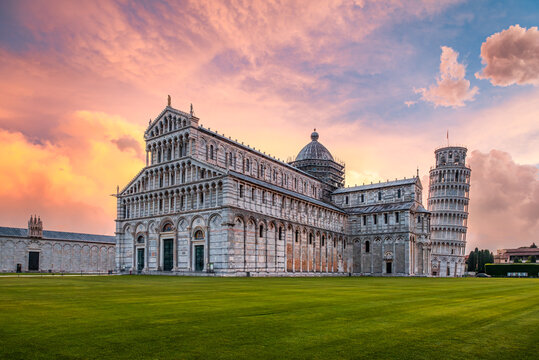Landscape with Cathedral and the Leaning Tower of Pisa at sunrise time, Tuscany, Italy