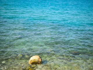 Blue ocean waves Clear blue sea stones stone nature relaxing background landscape outdoor summer season
