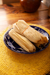 Tamales. Traditional dish typical of Mexico and some Latin American countries. Corn dough wrapped in corn leaves. The tamales are steamed.