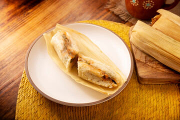 Tamales. Traditional dish typical of Mexico and some Latin American countries. Corn dough wrapped in corn leaves. The tamales are steamed.