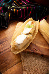 Tamales. Traditional dish typical of Mexico and some Latin American countries. Corn dough wrapped in corn leaves. The tamales are steamed.
