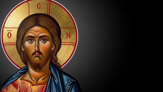 An Eastern Orthodox icon of Jesus Christ Pantocrator. Traditional Byzantine religious painting with a gold halo on a dark background with copy space.