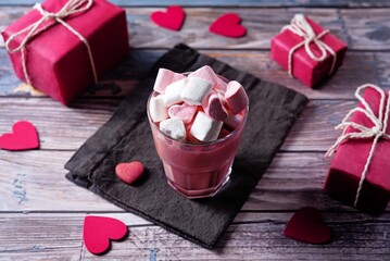 Red velvet hot cocoa drink with marshmallow topping
