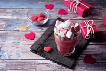 Red velvet hot cocoa drink with marshmallow topping