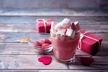 Red velvet hot cocoa drink with marshmallow topping