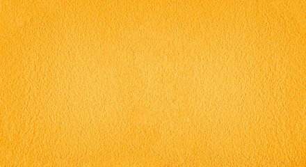 Naklejka premium close up of a yellow painted wall with light streaks casting shadows across the textured surface
