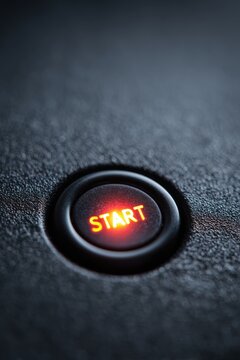 Close-Up of Illuminated Start Button with Crisp Texture