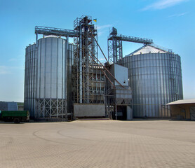 granaries at the elevator complex, agro-industrial building with tanks