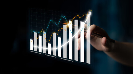A professional examines dynamic graphs and data visualizations, demonstrating the significance of data analysis in enhancing business strategies and achieving growth. Impute