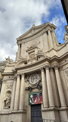 Fototapeta premium Baroque Facade of San Marcello al Corso Church in Rome with Sculptures. Italy